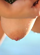 Alison Angel takes off her sweet bikini